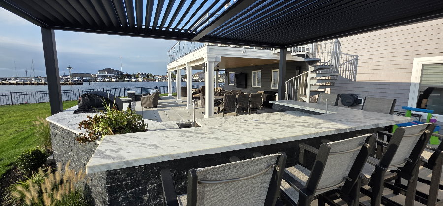 outdoor kitchen with pergola